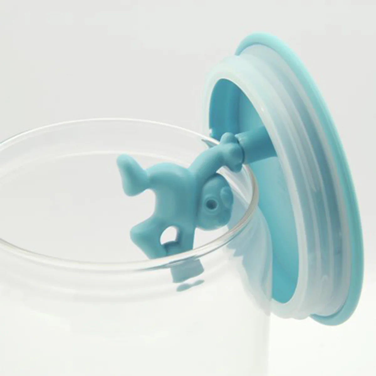 alessi-gianni-little-man-holding-on-tight-blue-storage-jar-900ml-2_6e491cce-e598-4986-a011-28bb540689ff